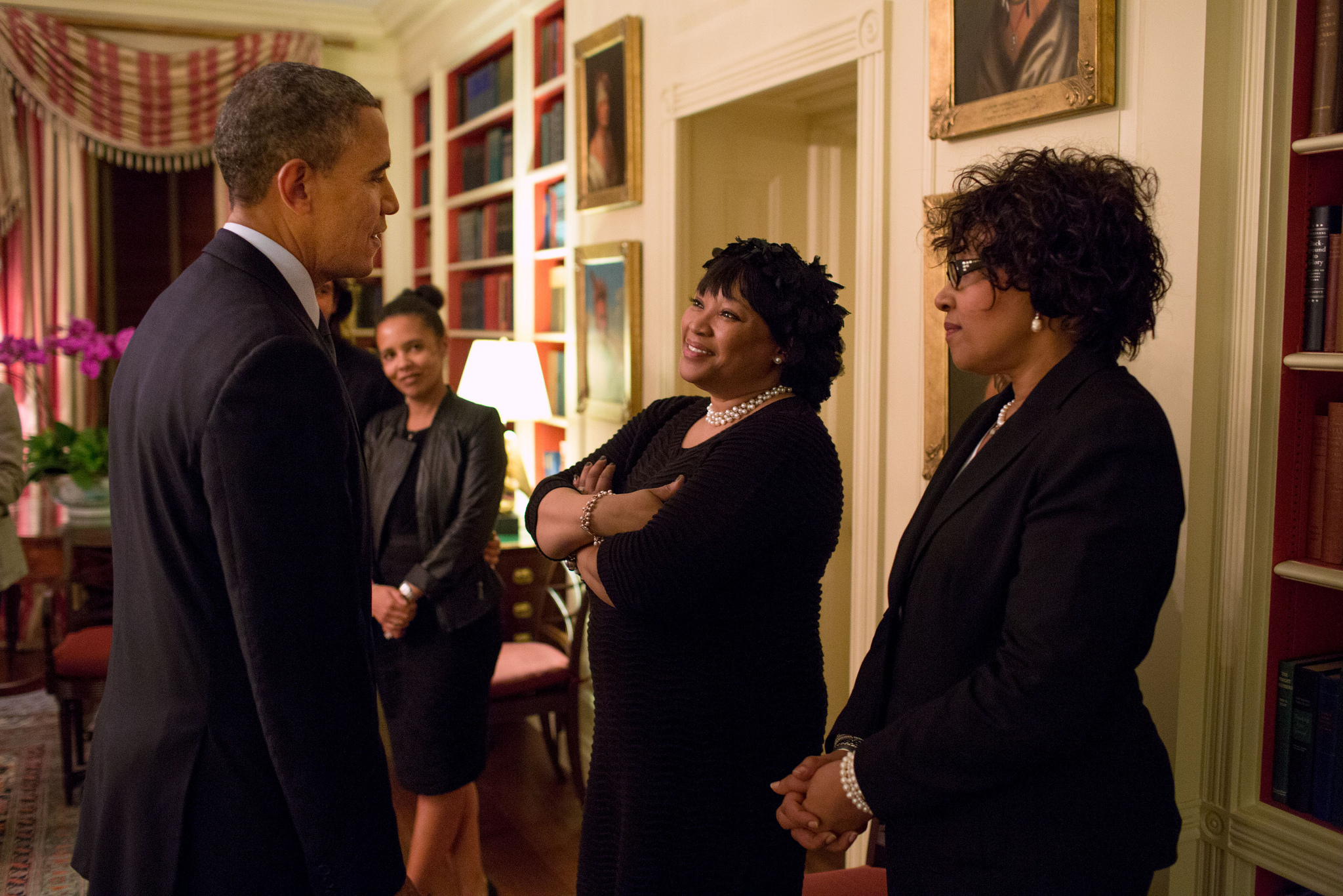 Barack Obama with Zindzi and Zenani Mandela